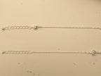 Extender chains and ribbed end beads on the pair of clover and star payal.