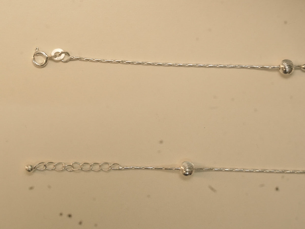 Spring ring clasp and extender chain on the heart and heel payal.
