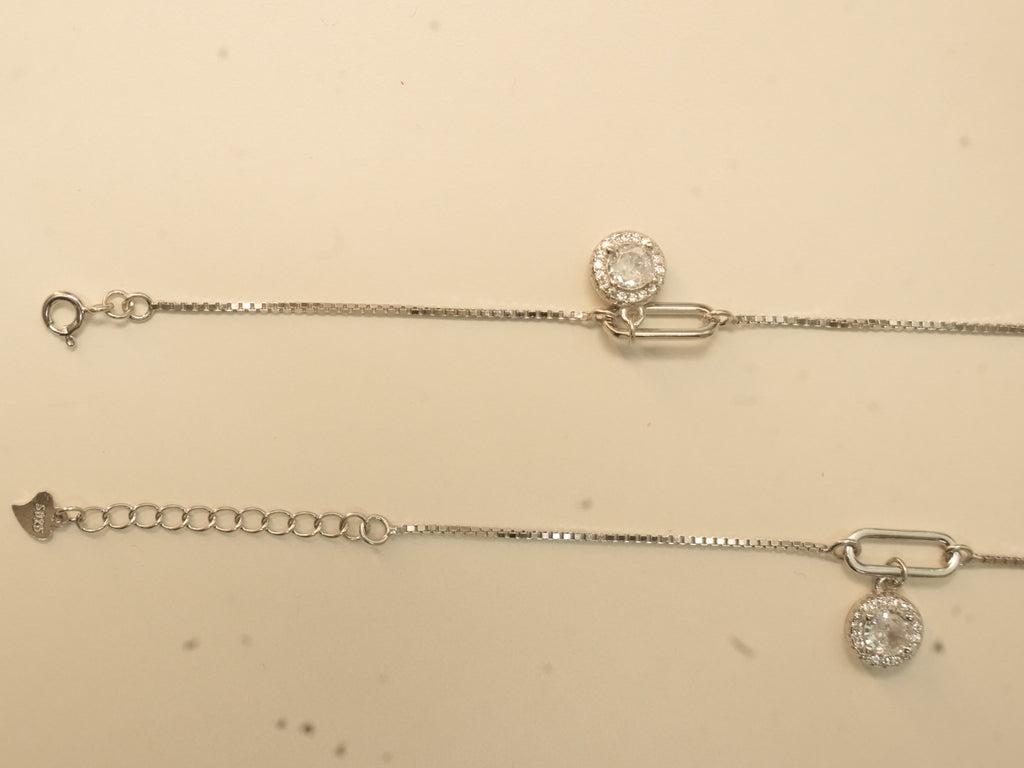 Spring ring clasp and extender chain with a heart tag on the paperclip link payal.