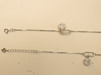 Spring ring clasp and extender chain with a heart tag on the paperclip link payal.