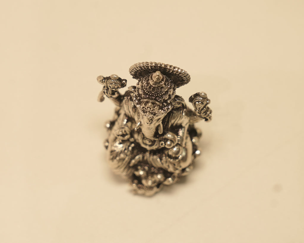 Looking down on the antique silver Ganesh idol from above.