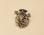 Looking down on the antique silver Ganesh idol from above.