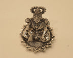 Looking down on the large silver Lakshmi idol from above.