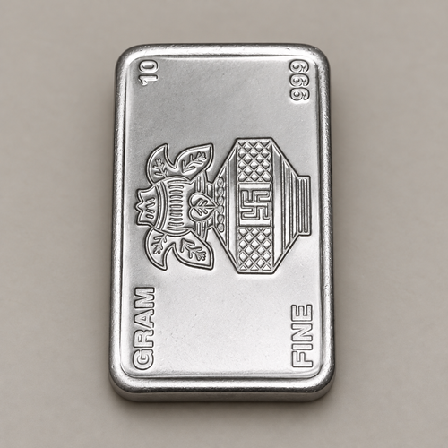 10 gram fine silver bar with a kalash and swastik on the face, stamped 10 gram 999 fine, on a beige surface.