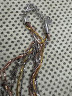 End cap, 925 stamp, lobster clasp and extender chain of the sterling silver box chain necklace.