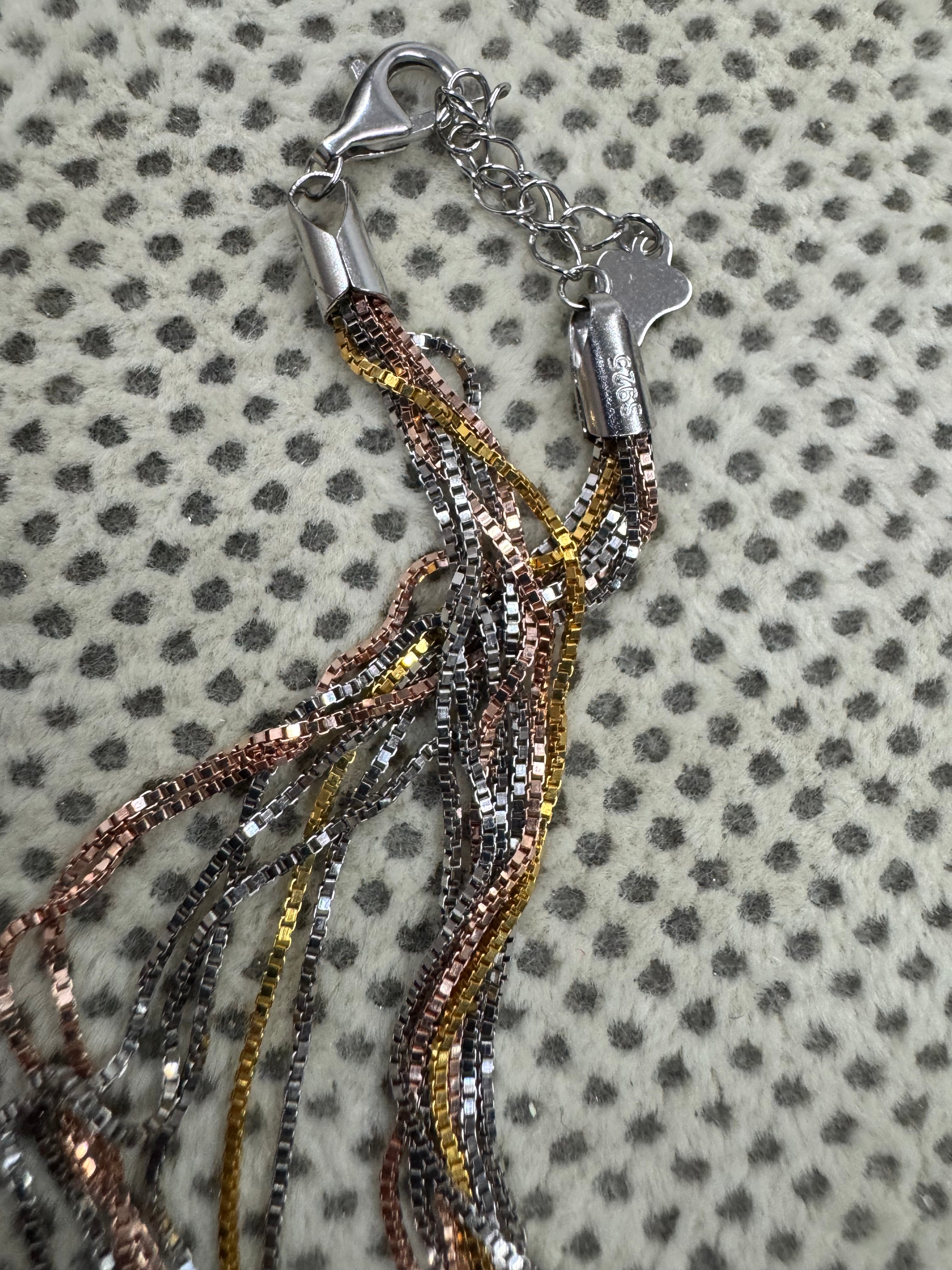 End cap, 925 stamp, lobster clasp and extender chain of the sterling silver box chain necklace.