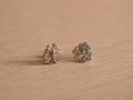 Pair of sterling silver stud earrings with pave set American Diamond butterfly wings around a centre stone.