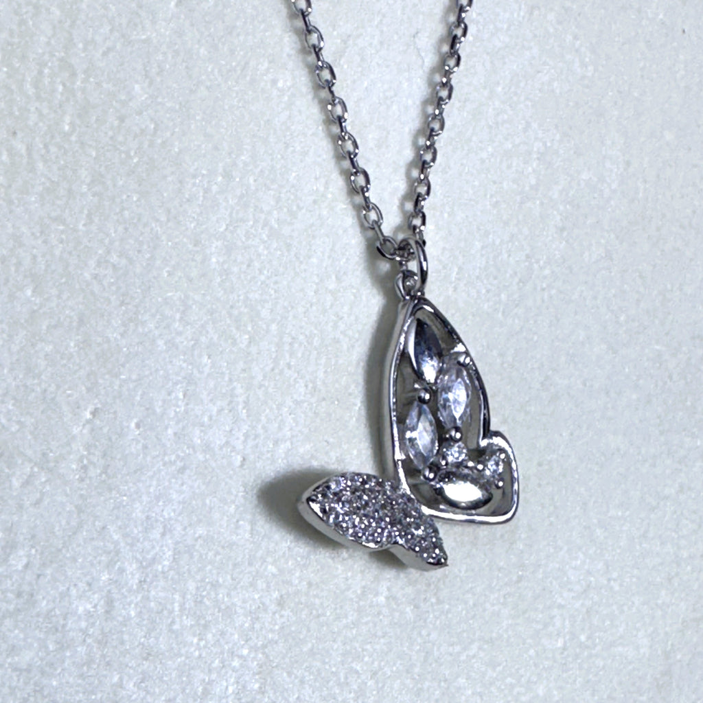 The butterfly pendant necklace seen from the other side.