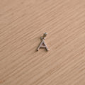 Sterling silver initial A pendant pave set with American Diamond, shown with its bail on a plain background.