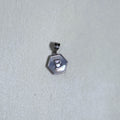 Sterling silver hexagon initial pendant with a mother of pearl face and the letter B.
