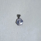 Sterling silver hexagon initial pendant with a mother of pearl face and the letter B.