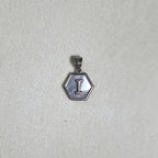 The letter I pendant seen from a slight angle.