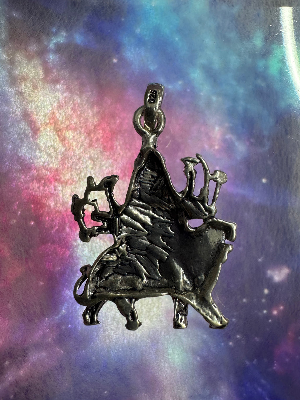 Reverse of the sterling silver Durga pendant, showing the hollowed back and the stamp on the bail.