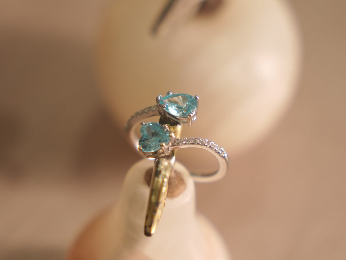 Angled view of the bypass ring, showing the open wrap of the band.