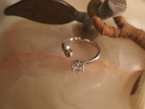 Close view of the open front of the ring, showing the crown set American Diamond.