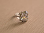 Close view of the cushion cut centre and the oval and baguette frame.