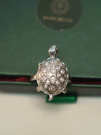 Top view of the tortoise ring, showing the pave set cells of the shell.