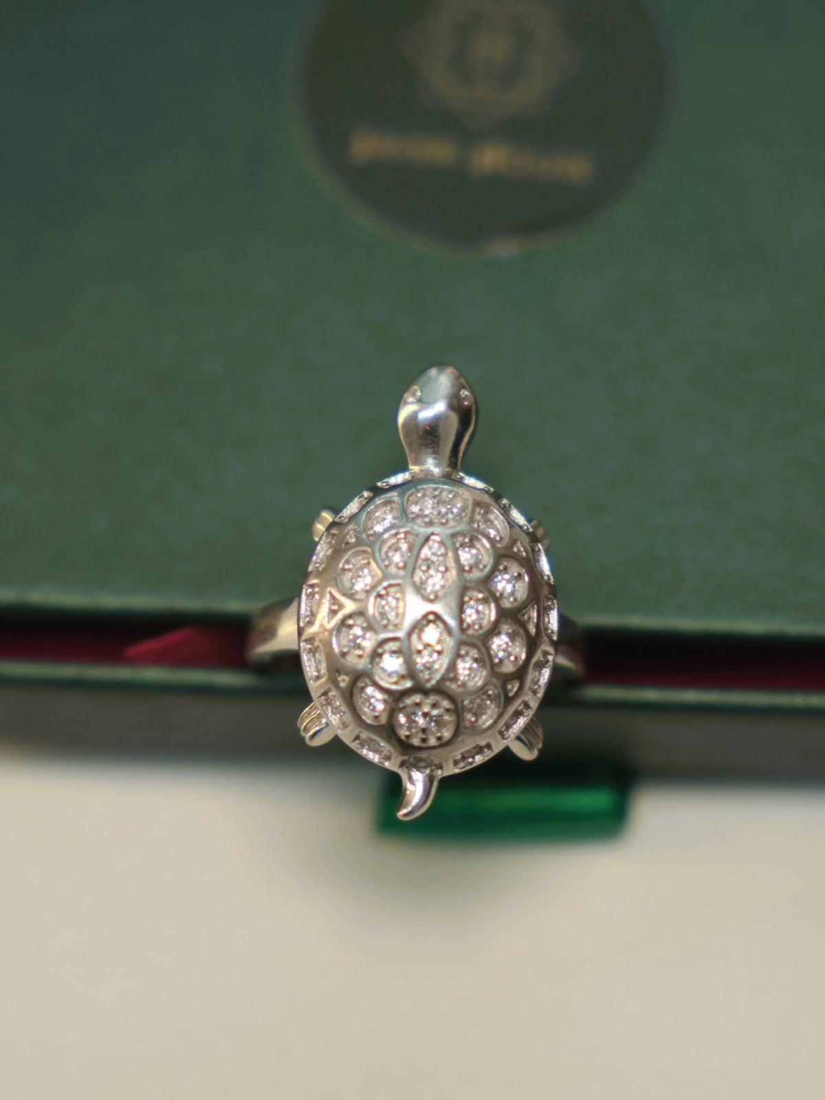 Top view of the tortoise ring, showing the pave set cells of the shell.
